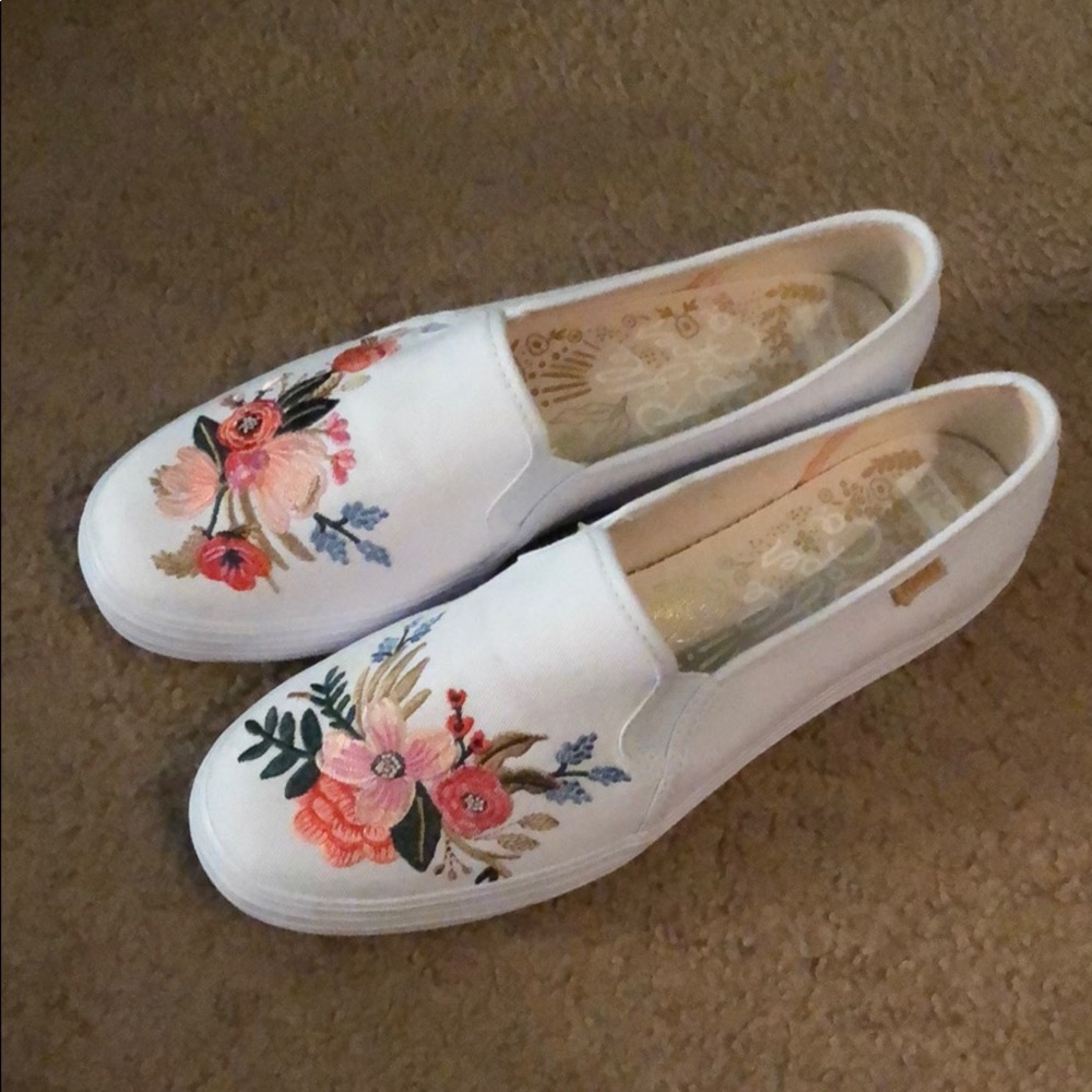 White and floral Keds sneakers